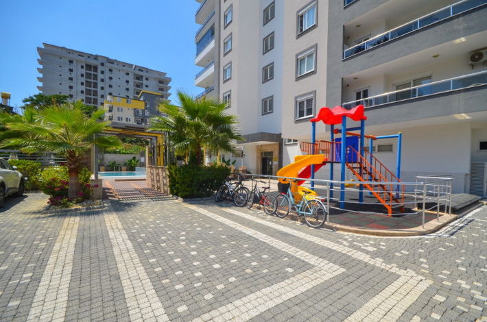 Квартира 1+1 в комплексе с инфраструктурой в начале Махмутлара, 75 м2 - Ракурс 6