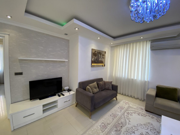 Трехкомнатная меблированная квартира в Махмутлар, 110 м2 - Ракурс 2