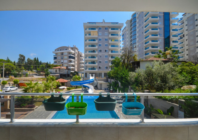 Квартира 1+1 в комплексе с инфраструктурой в начале Махмутлара, 75 м2 - Ракурс 8