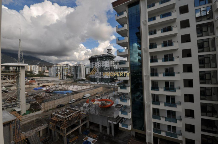 Три квартиры 1+1 в самом грандиозном комплексе Махмутлара, 81 м2 - Ракурс 14