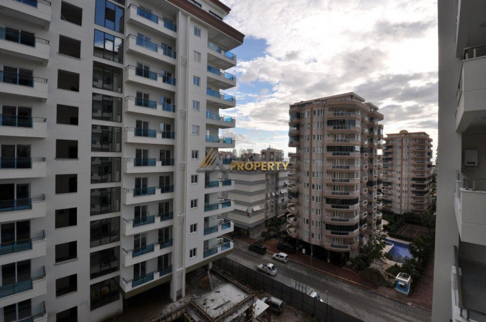 Три квартиры 1+1 в самом грандиозном комплексе Махмутлара, 81 м2 - Ракурс 15