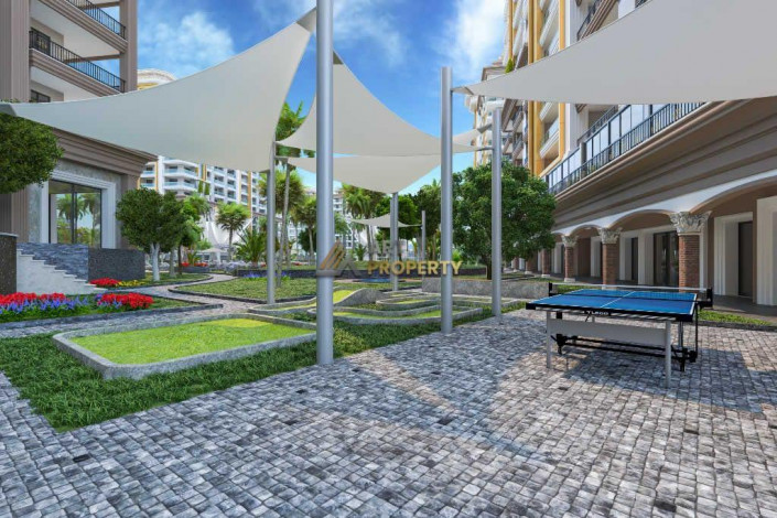 Три квартиры 1+1 в самом грандиозном комплексе Махмутлара, 81 м2 - Ракурс 20