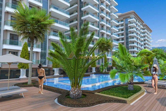 Три квартиры 1+1 в самом грандиозном комплексе Махмутлара, 81 м2 - Ракурс 25