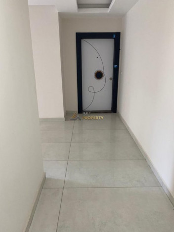 Квартиры 1+1 и 3+1 на продажу в самом центре Махмутлара, 65-180 м2 - Ракурс 6