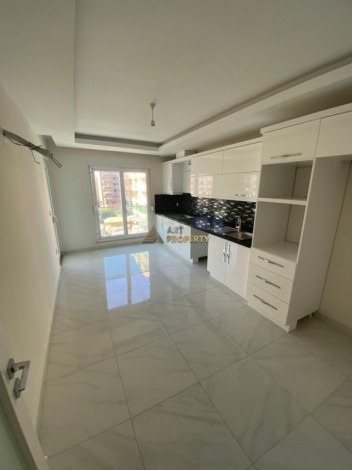 Квартиры 1+1 и 3+1 на продажу в самом центре Махмутлара, 65-180 м2 - Ракурс 7
