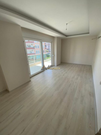 Квартиры 1+1 и 3+1 на продажу в самом центре Махмутлара, 65-180 м2 - Ракурс 15