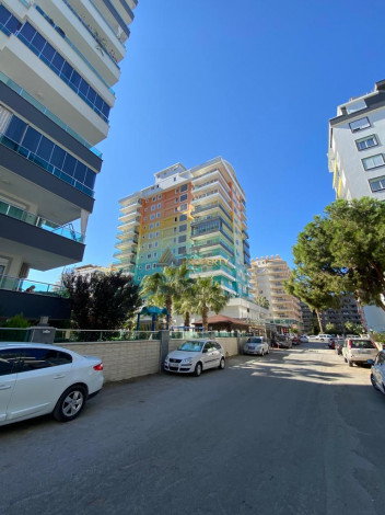 Квартиры 1+1 и 3+1 на продажу в самом центре Махмутлара, 65-180 м2 - Ракурс 20