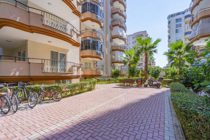 Трехкомнатная квартира на высоком этаже с видом на море в районе Махмутлар, 120 м2 - Ракурс 2