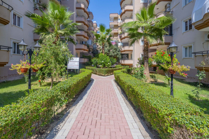 Трехкомнатная квартира на высоком этаже с видом на море в районе Махмутлар, 120 м2 - Ракурс 3