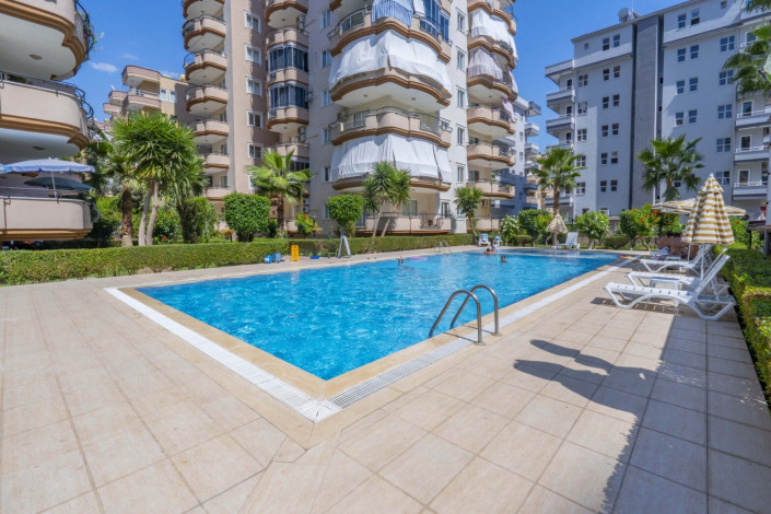 Трехкомнатная квартира на высоком этаже с видом на море в районе Махмутлар, 120 м2 - Ракурс 4