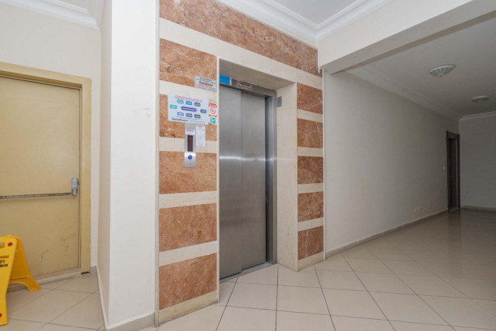 Трехкомнатная квартира на высоком этаже с видом на море в районе Махмутлар, 120 м2 - Ракурс 8