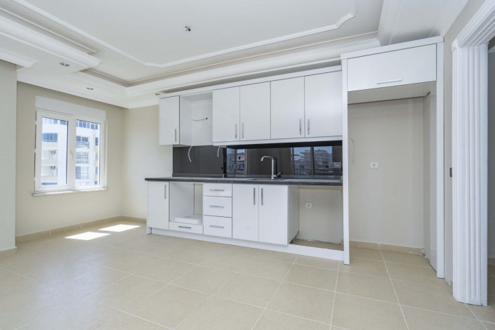 Трехкомнатная квартира на высоком этаже с видом на море в районе Махмутлар, 120 м2 - Ракурс 10