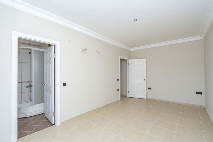 Трехкомнатная квартира на высоком этаже с видом на море в районе Махмутлар, 120 м2 - Ракурс 14