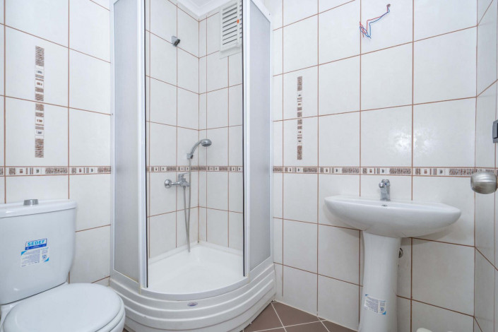 Трехкомнатная квартира на высоком этаже с видом на море в районе Махмутлар, 120 м2 - Ракурс 16