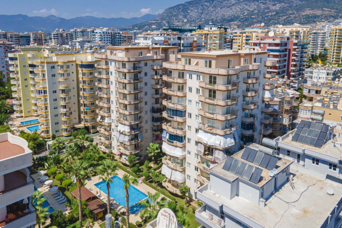 Трехкомнатная квартира на высоком этаже с видом на море в районе Махмутлар, 120 м2 - Ракурс 24