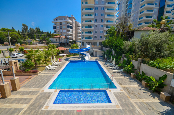 Квартира 1+1 в комплексе с инфраструктурой в начале Махмутлара, 75 м2 - Ракурс 16