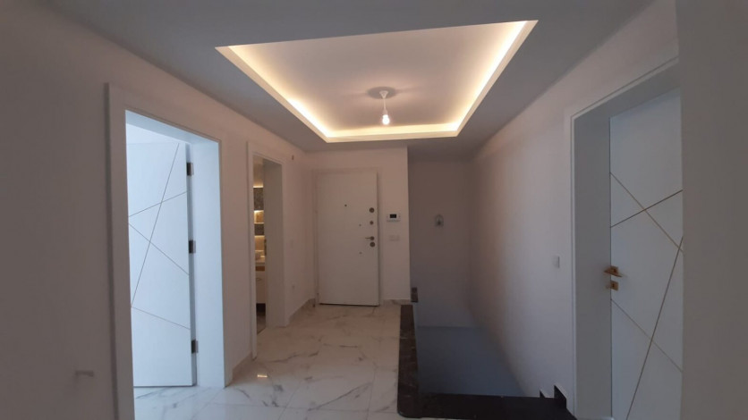 Четырехкомнатная квартира –пентхаус в районе Махмутлар, 234м - Ракурс 8