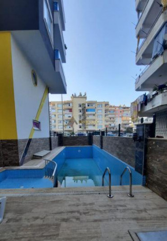 Трехкомнатная квартира в 200 метрах от моря в районе Махмутлар, 100 м2 - Ракурс 2