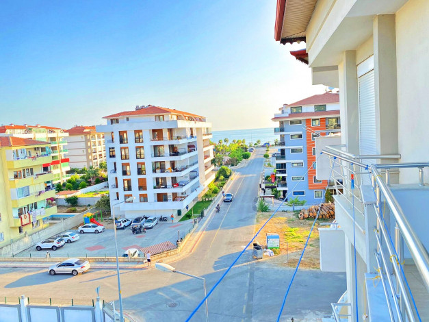 Меблированный дуплекс 5+1 с дизайнерским ремонтом в 100м от Средиземного моря в районе Кестель, 250м - Ракурс 2