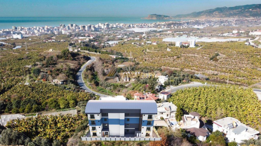 Квартиры 1+1 на этапе строительства в Махмутларе, 55 м2 - Ракурс 10