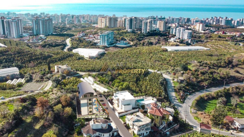 Квартиры 1+1 на этапе строительства в Махмутларе, 55 м2 - Ракурс 12