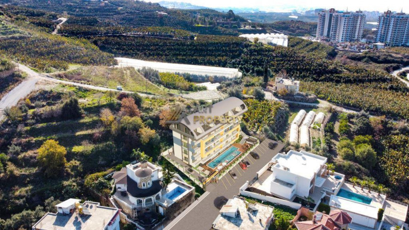 Квартиры 1+1 на этапе строительства в Махмутларе, 55 м2 - Ракурс 30