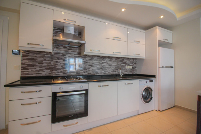 Квартира 1+1 с мебелью в центральной части района Махмутлар, 70 м2 - Ракурс 4