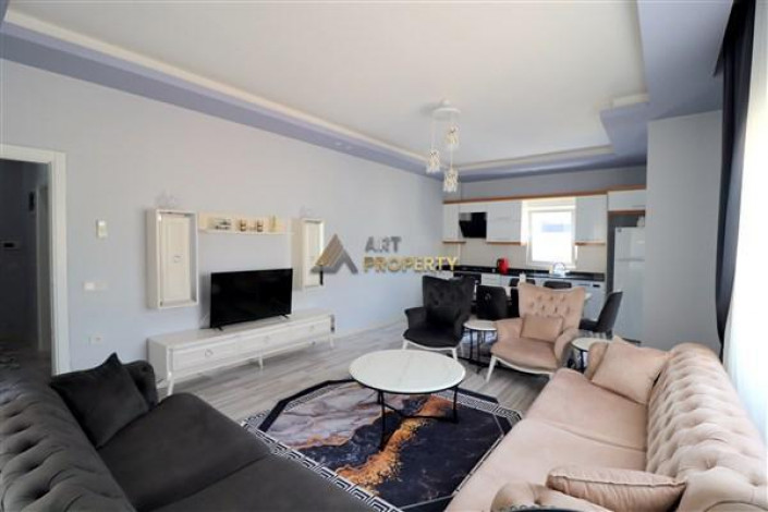 Трехкомнатная квартира в 100 метрах от моря с видом на Торосские горы в районе Махмутлар, 120 м2 - Ракурс 2