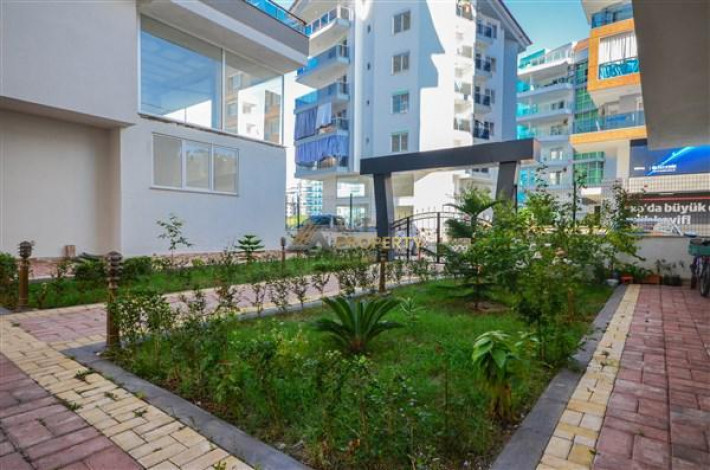 Трехкомнатная квартира в 100 метрах от моря с видом на Торосские горы в районе Махмутлар, 120 м2 - Ракурс 3