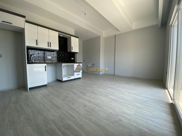 Квартира 1+1 в новом доме в Махмутлар, 47м - Ракурс 2