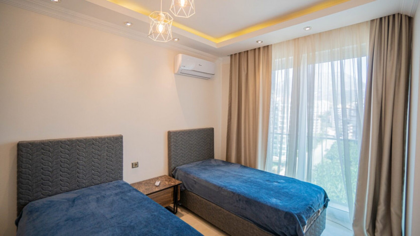 Квартира 2+1 с красивым видом на море в Махмутларе, 125 м2 - Ракурс 12