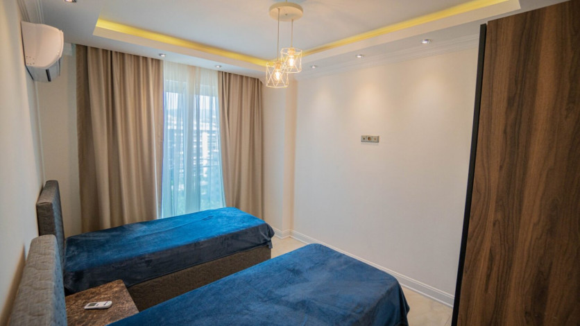 Квартира 2+1 с красивым видом на море в Махмутларе, 125 м2 - Ракурс 13