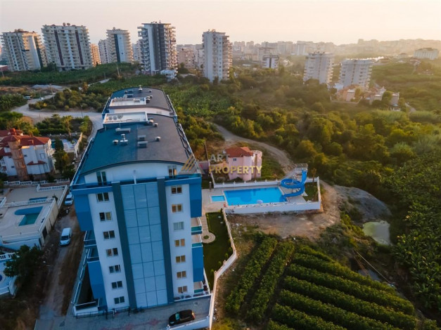 Двухуровневая квартира 2+1 в новостройке в тихом месте Махмутлара, 100 м2 - Ракурс 32