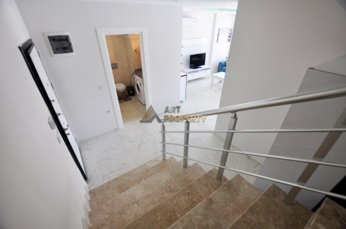 Двухуровневая квартира 2+1 с мебелью в самом центре Махмутлара, 120 м2 - Ракурс 18