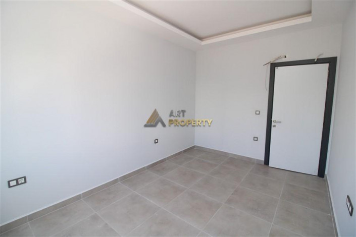 Квартира 1+1 в новостройке в тихом месте района Махмутлар, 56 м2 - Ракурс 6