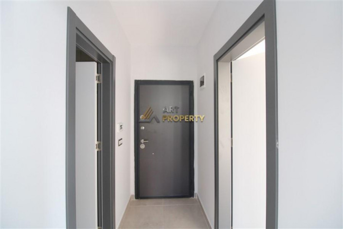 Квартира 1+1 в новостройке в тихом месте района Махмутлар, 56 м2 - Ракурс 9