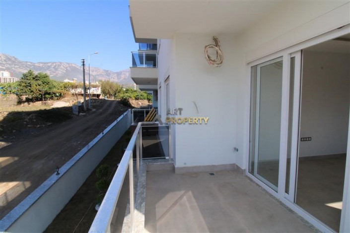 Квартира 1+1 в новостройке в тихом месте района Махмутлар, 56 м2 - Ракурс 12