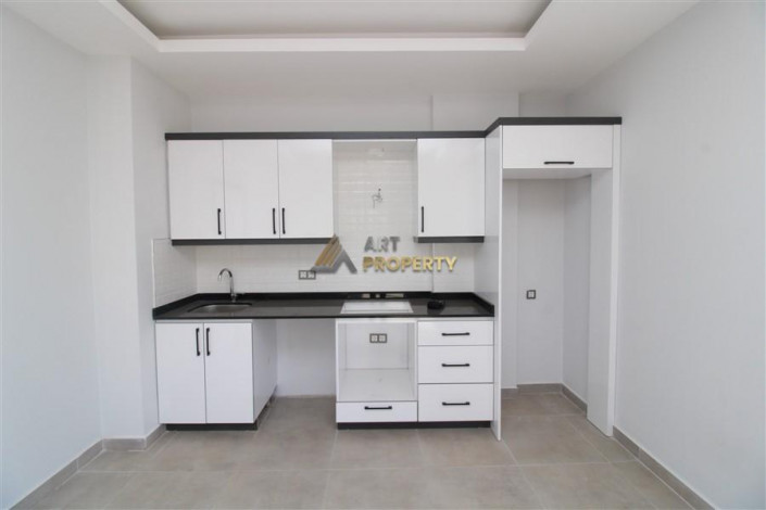 Квартира 1+1 в новостройке в тихом месте района Махмутлар, 56 м2 - Ракурс 14