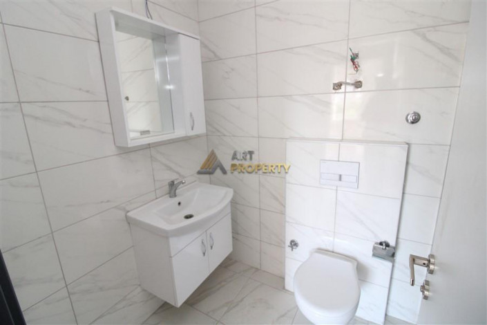 Квартира 1+1 в новостройке в тихом месте района Махмутлар, 56 м2 - Ракурс 19