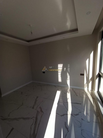 Квартира 1+1 на продажу в новом доме в районе Дамлаташ, 50 м2 - Ракурс 2