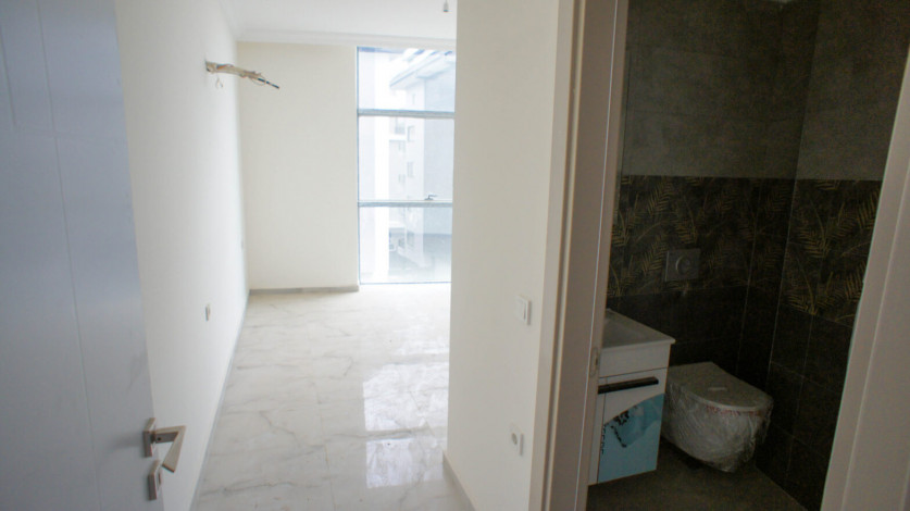 Трехкомнатная квартира в новом доме в районе Махмутлар, 100 м2 - Ракурс 9