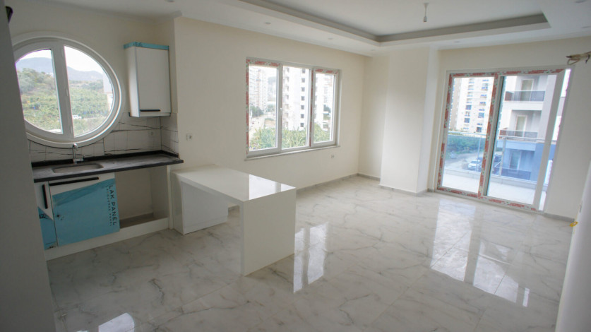 Трехкомнатная квартира в новом доме в районе Махмутлар, 100 м2 - Ракурс 26