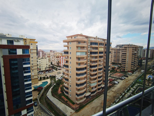 Двухкомнатная квартира вблизи от моря и вторничного рынка в Махмутларе, 67 м2 - Ракурс 8