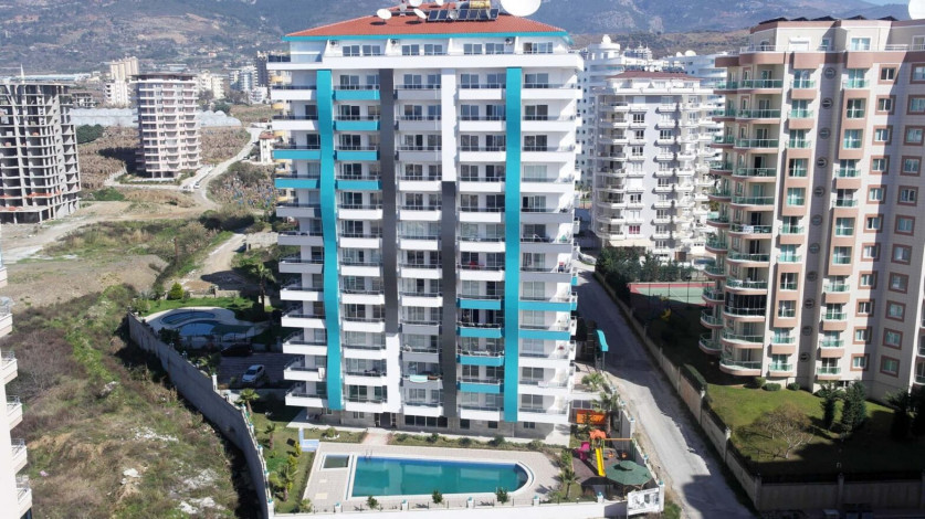 Двухкомнатная квартира вблизи от моря и вторничного рынка в Махмутларе, 67 м2 - Ракурс 15