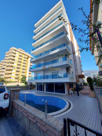 Двухкомнатная квартира в Махмутларе по отличной цене, 60 м2 - Ракурс 4