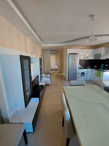 Двухкомнатная квартира в Махмутларе по отличной цене, 60 м2 - Ракурс 8