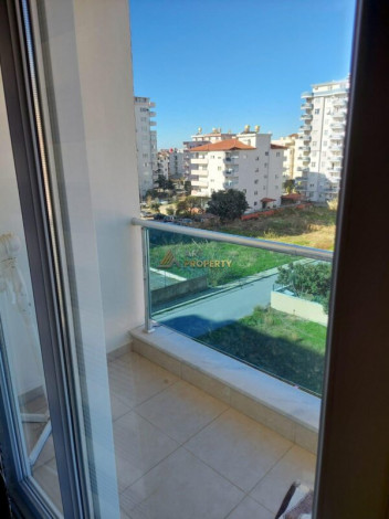 Двухкомнатная квартира в Махмутларе по отличной цене, 60 м2 - Ракурс 12