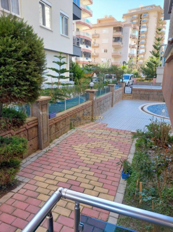 Двухкомнатная квартира в Махмутларе по отличной цене, 60 м2 - Ракурс 20