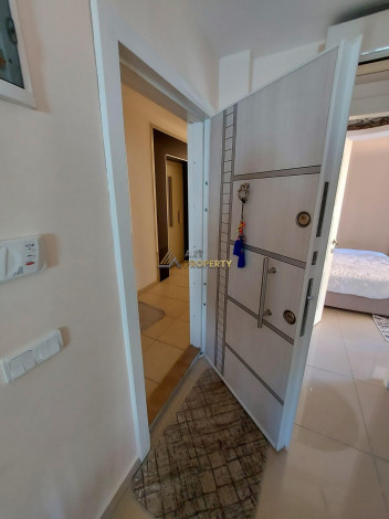 Двухкомнатная квартира в Махмутларе по отличной цене, 60 м2 - Ракурс 23