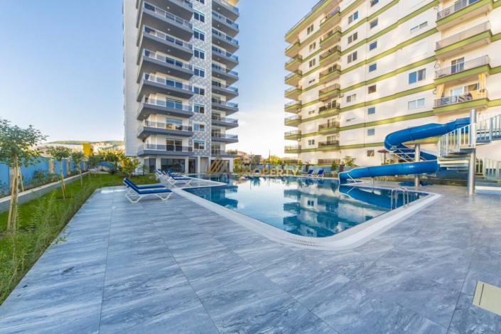 Двухкомнатная квартира 1+1 в комплексе с инфраструктурой в Махмутлар, 65 м2 - Ракурс 4